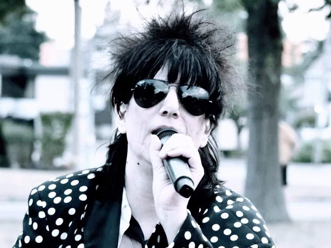 Mary Beth Cronin as Ric Ocasek of The Cars